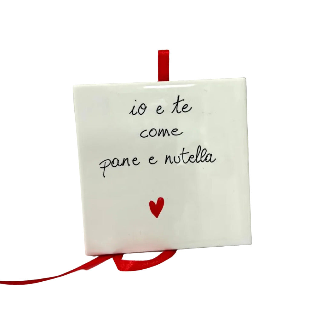 Piastrelline con citazione